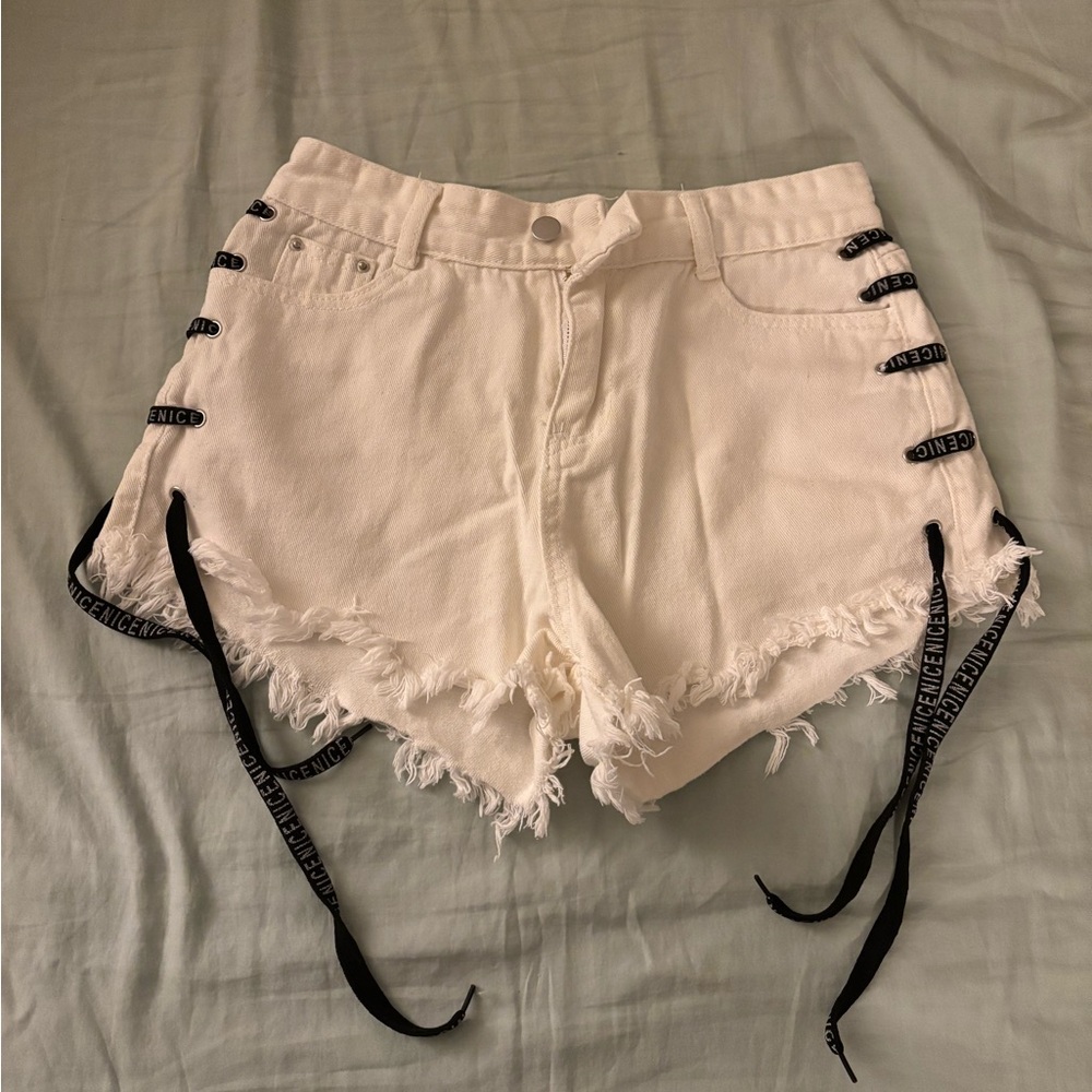 White denim shorts. Street fashion